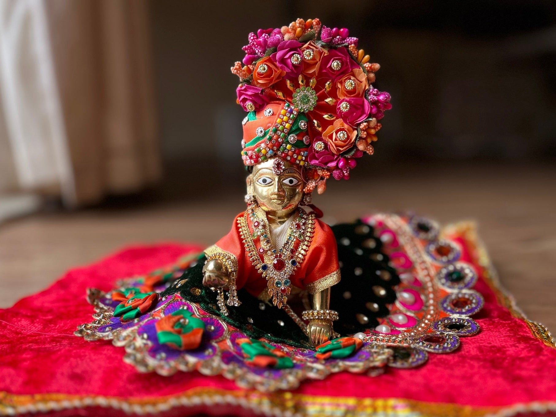 Laddu gopal in elegant dress and shringar