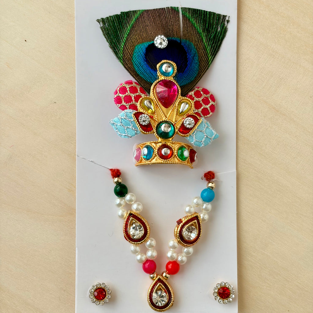 Laddu Gopal red mala mukut earring set with decorative diamonds, feather and stones for festive shringar