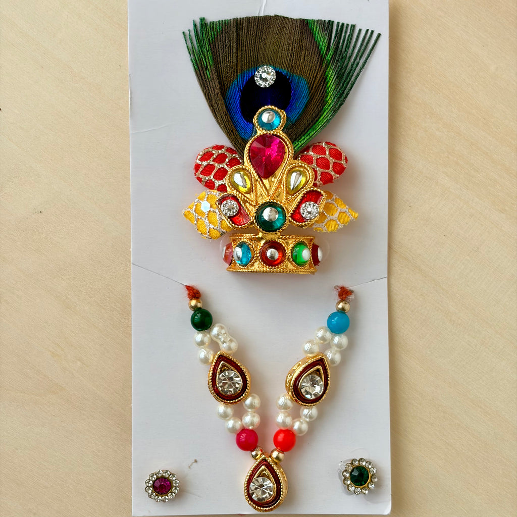 Laddu Gopal red mala mukut earring set with decorative diamonds, feather and stones for festive shringar