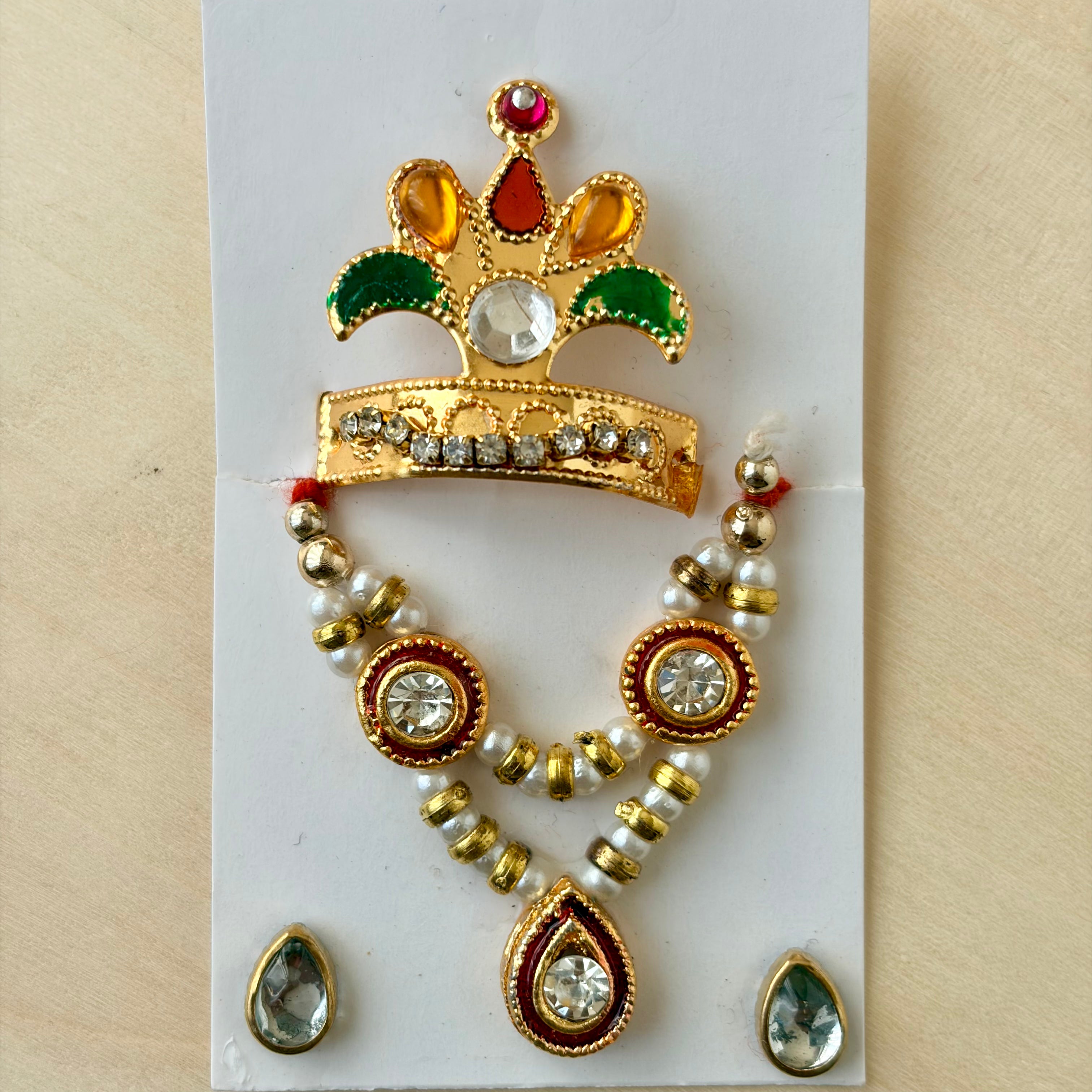 Laddu gopal mala mukut earring set with pearls, diamonds and stones for shringar