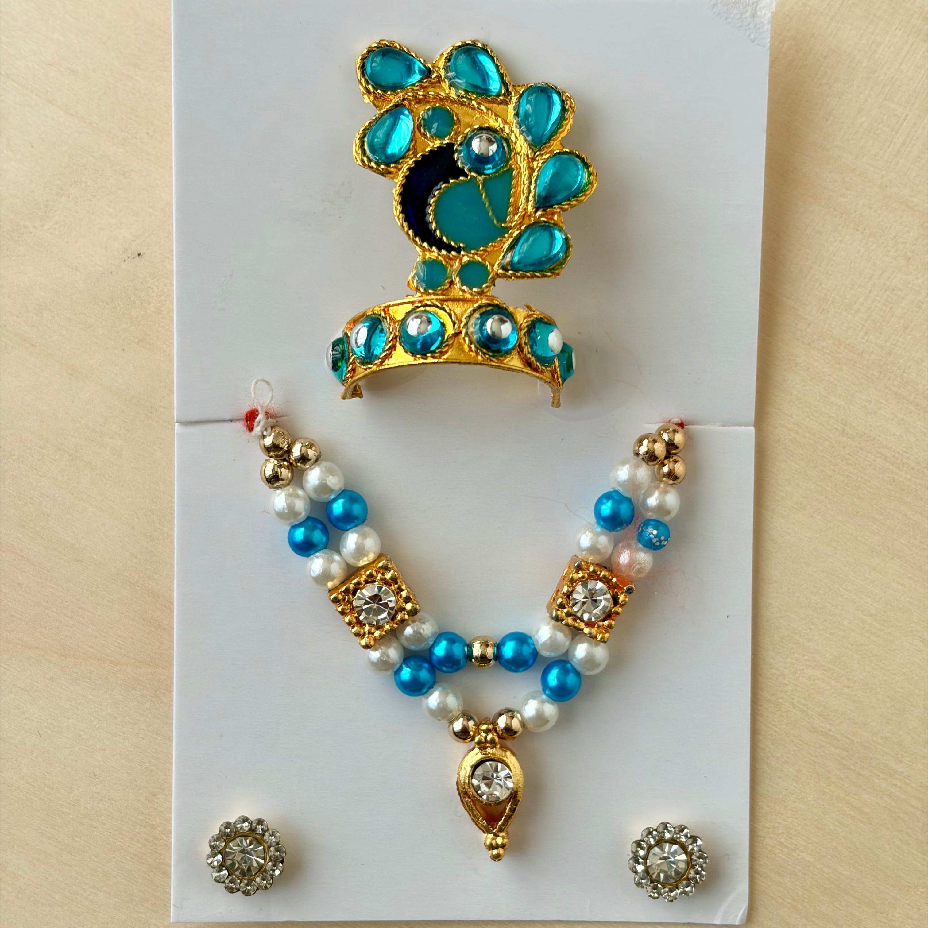 Laddu gopal orange mala mukut earring set with diamonds and stones for shringar