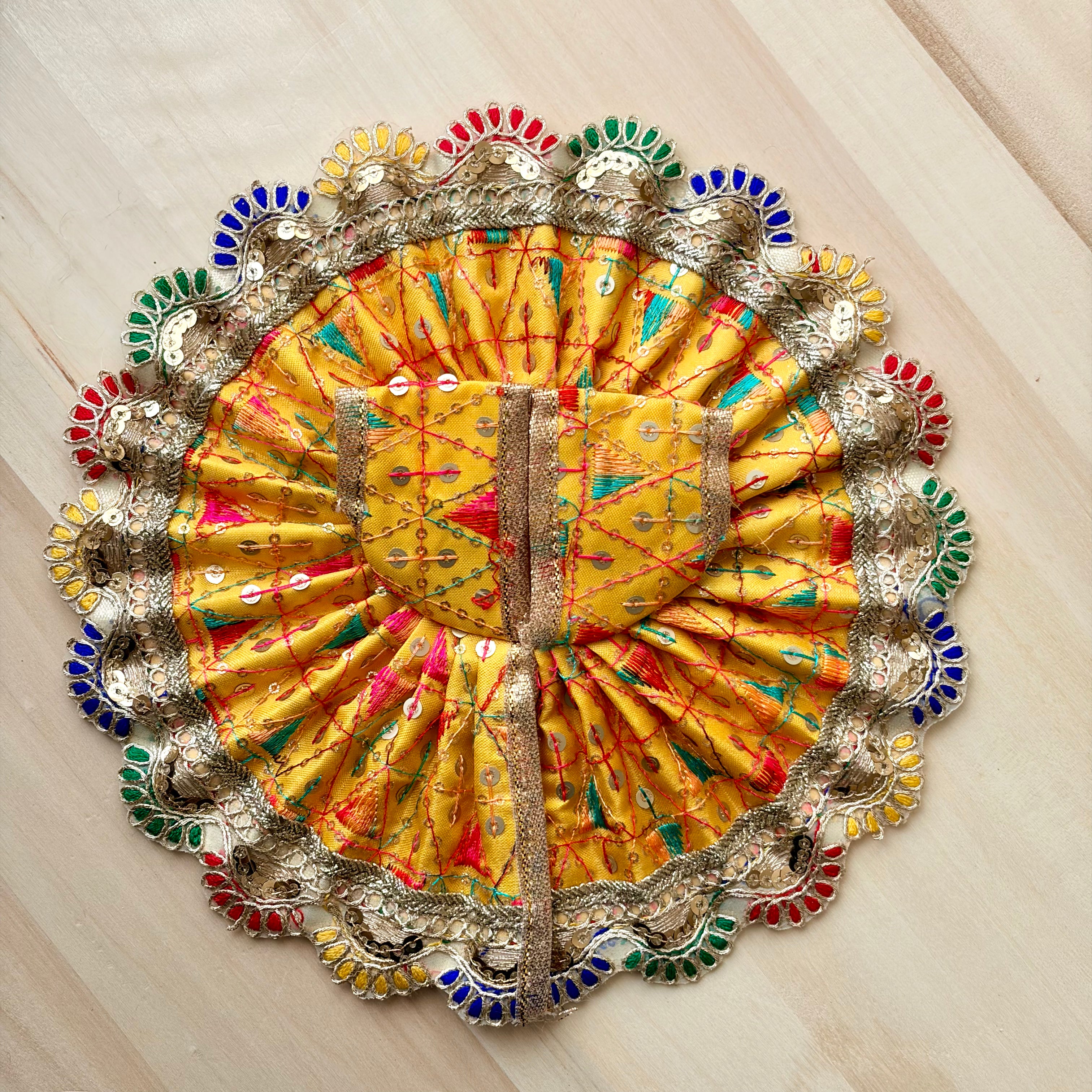 Multi colour border and yellow base Laddu Gopal dress with sequins