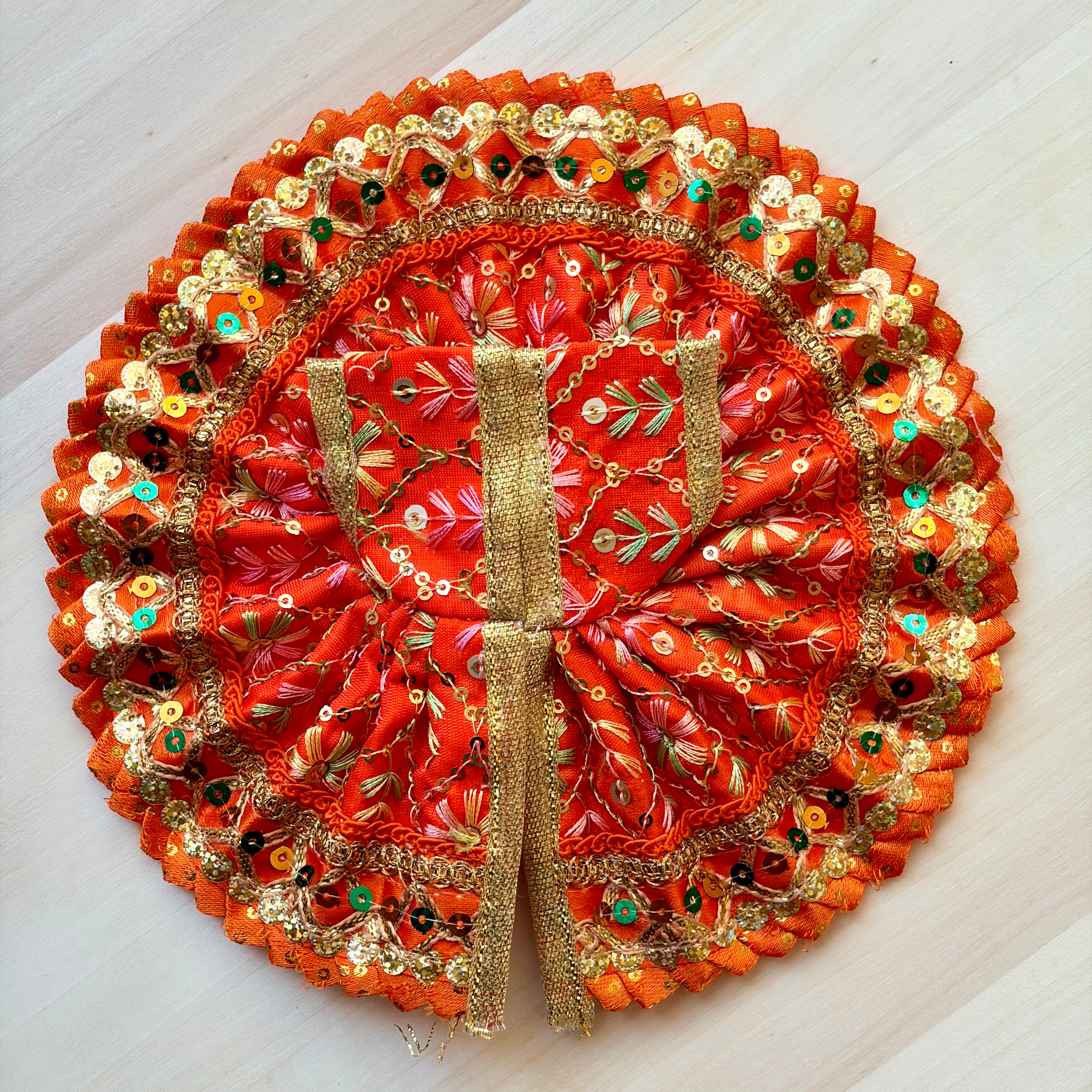 Orange Laddu Gopal dress for festive shringar in premium fabric with decorative detailing