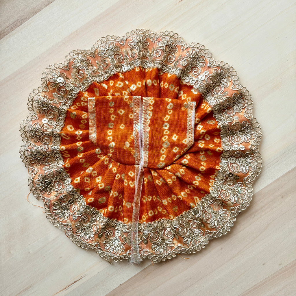 Orange bandhani Laddu Gopal dress for festive shringar in premium fabric with decorative detailing