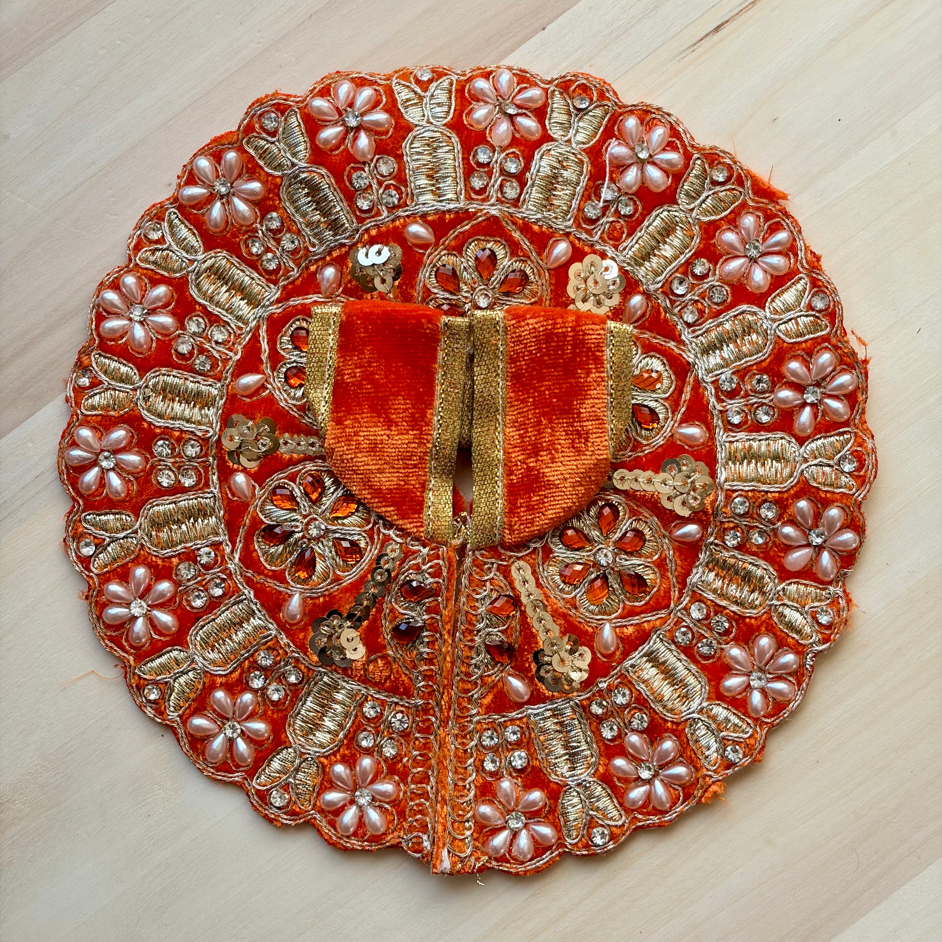 Orange velvet with pearl work Laddu Gopal dress for festive shringar in premium fabric with decorative detailing