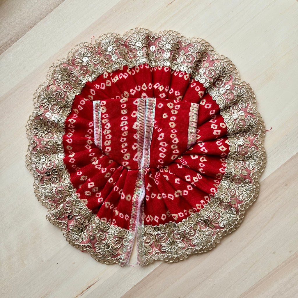 Red bandhani Laddu Gopal dress for festive shringar in premium fabric with decorative detailing