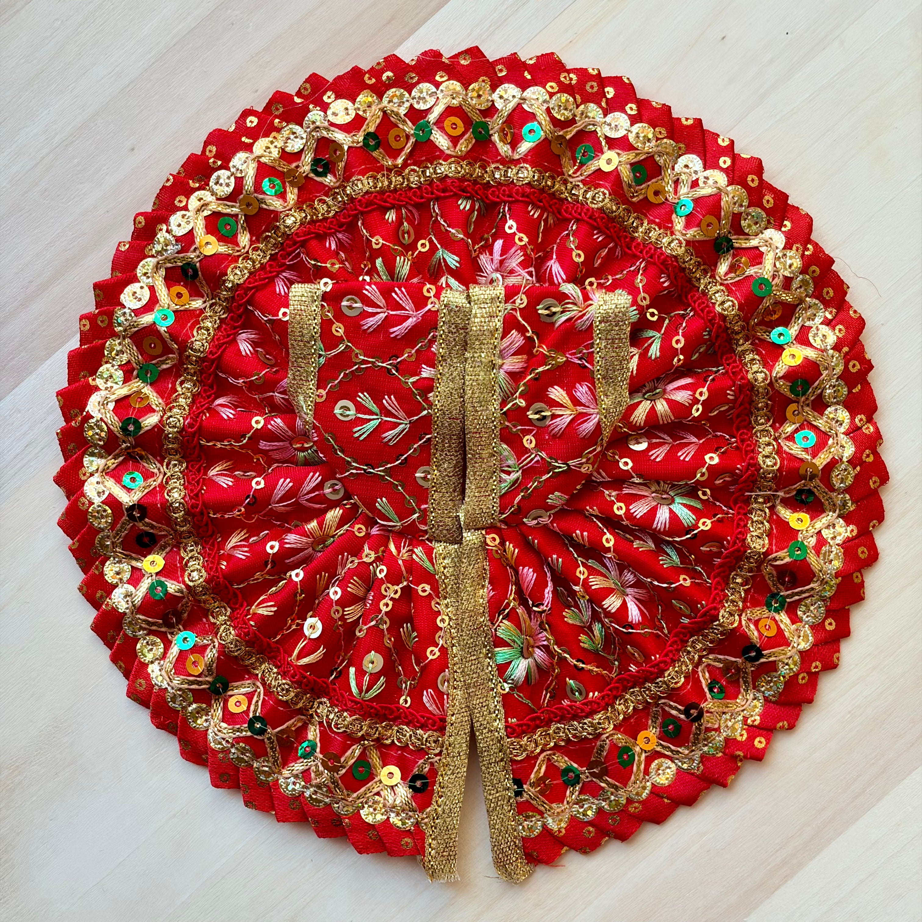 Red sequins Laddu Gopal dress for festive shringar in premium fabric with decorative detailing
