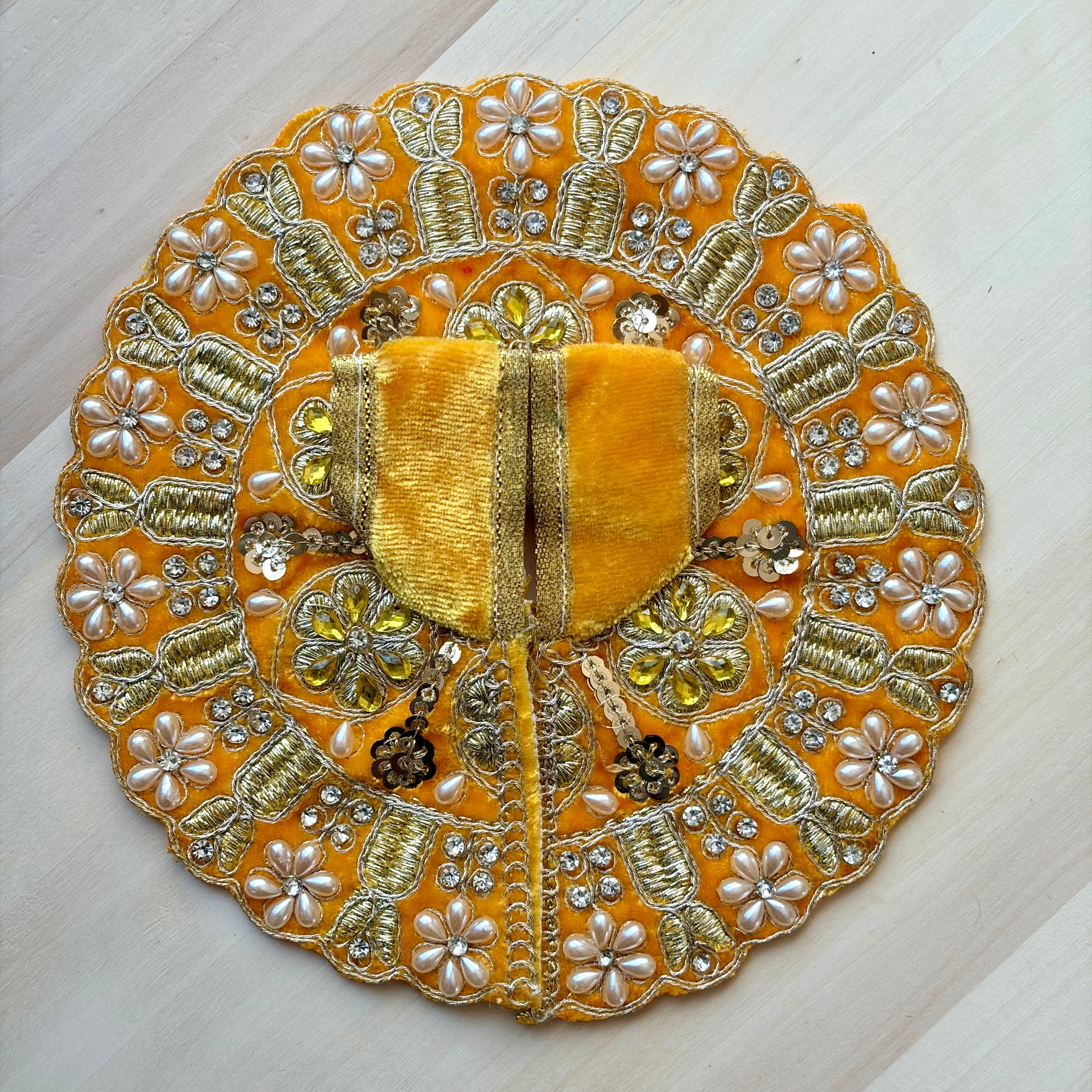 Yellow velvet Laddu Gopal dress for festive shringar in premium fabric with decorative detailing